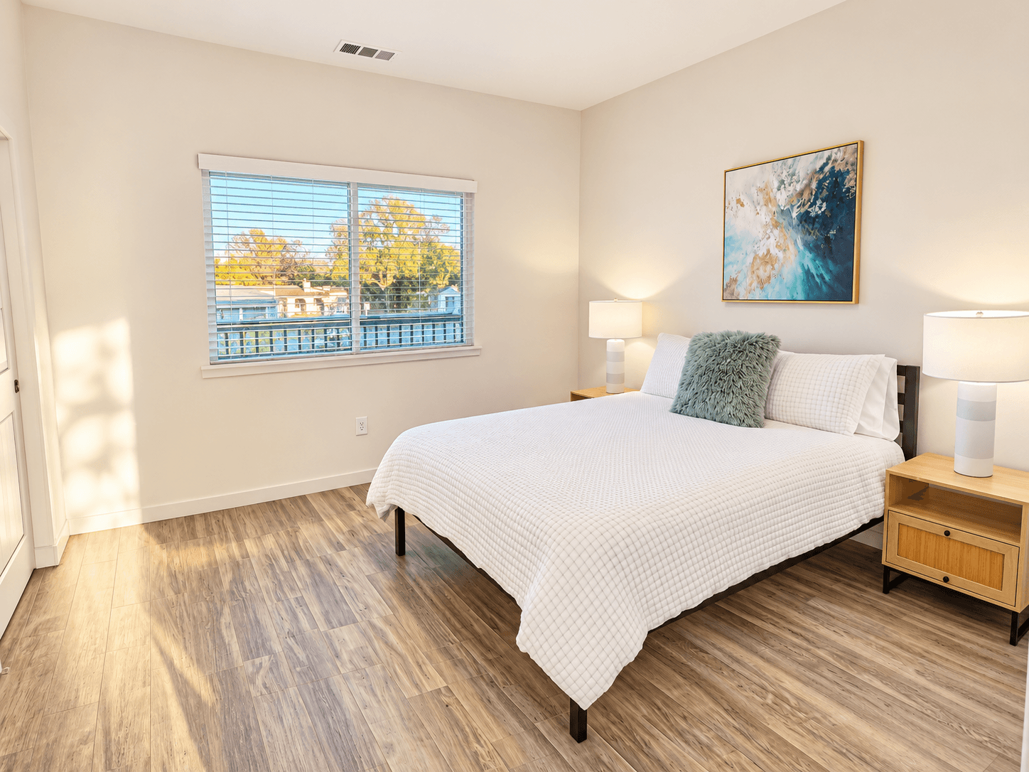 Cabernet Suite second queen bedroom with natural window light