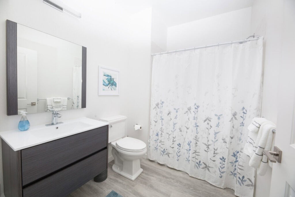 ADA-compliant bathroom with shower/tub combo, designed for comfort.
