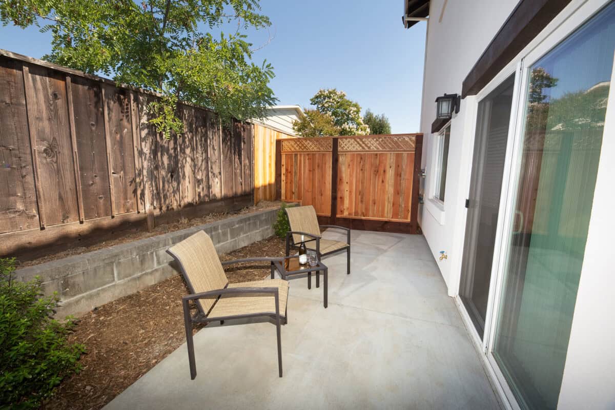 Private patio accessed from living room, perfect for morning coffee or relaxing.